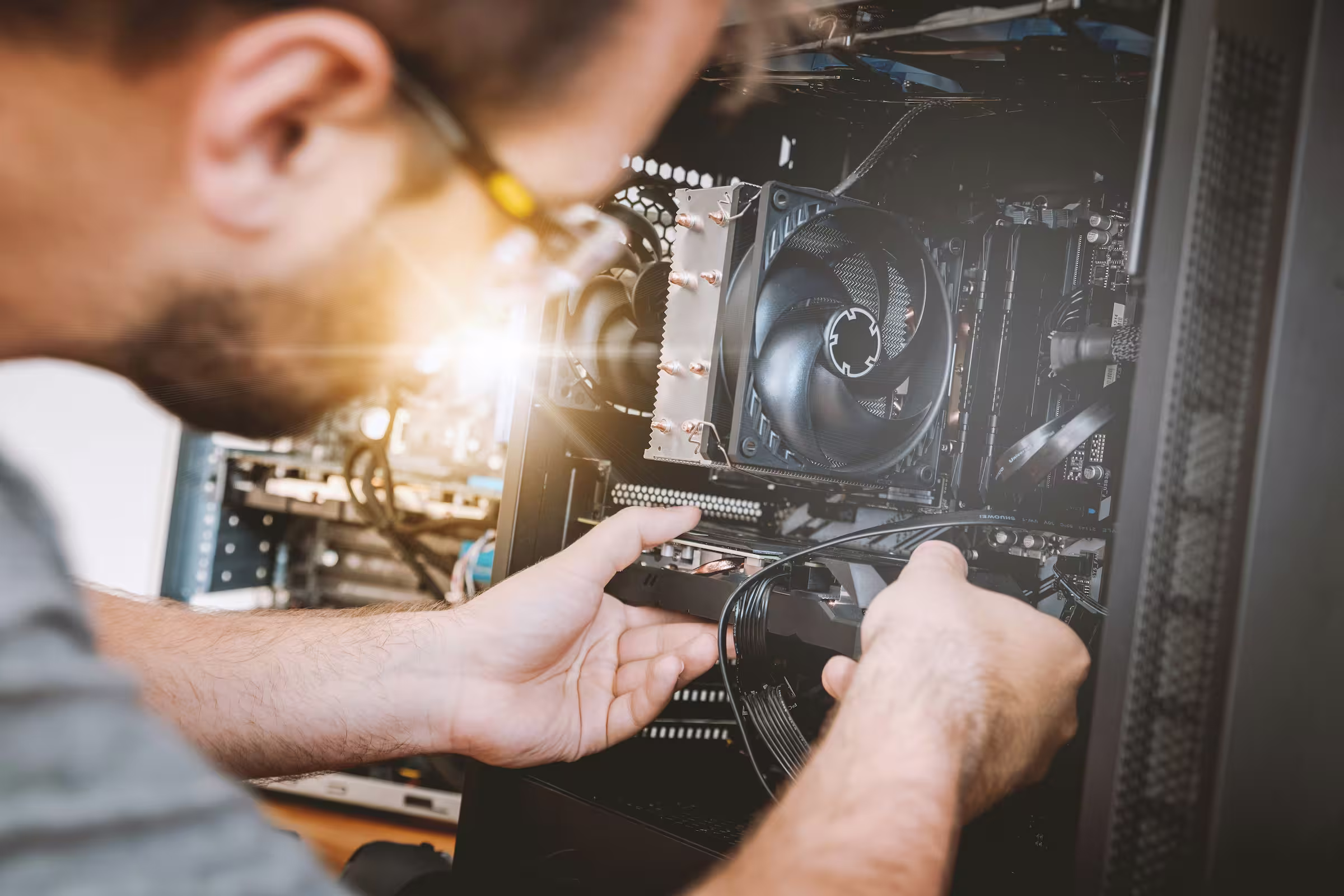 Technician fixing a computer