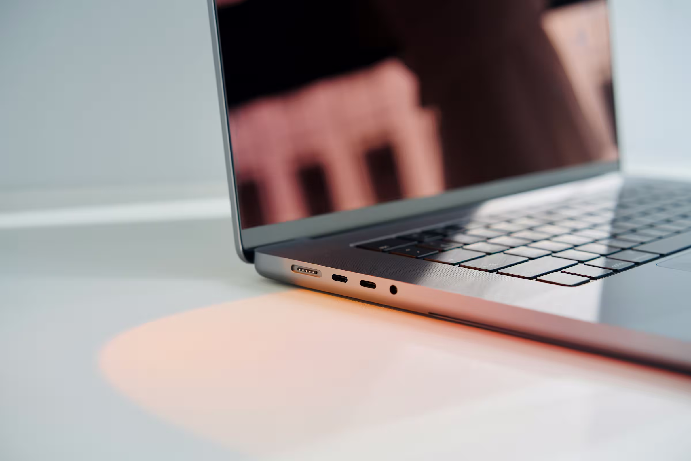 Technician placing a laptop for repair