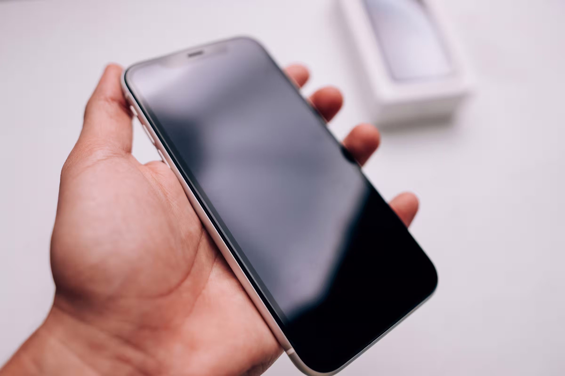 Technician holding a fixed phone